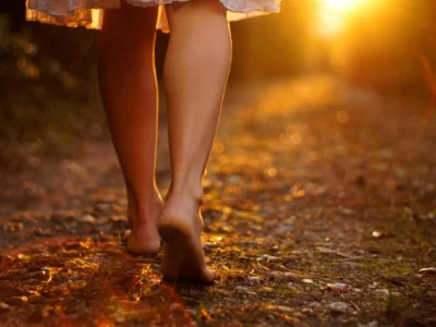 Woman walking barefoot