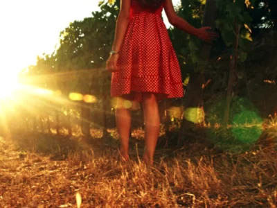 Autumn treats for your feet - a woman walking in a meadow in autumn