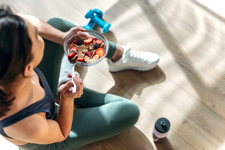 Woman eating health foods to boost her energy