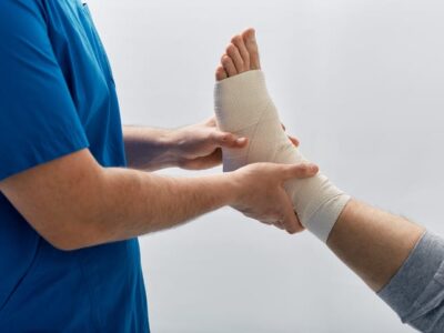 Person with bandage on foot to prevent foot and ankle injury