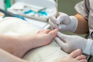Podiatrist treating an ingrown toenail