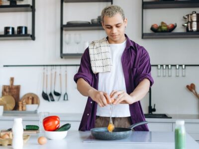 Person cooking filling foods