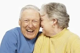 An older couple smiling