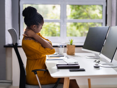 Woman sitting at her desk in an office