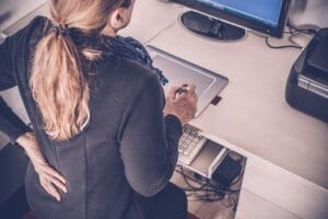 Woman with pain in her lower back
