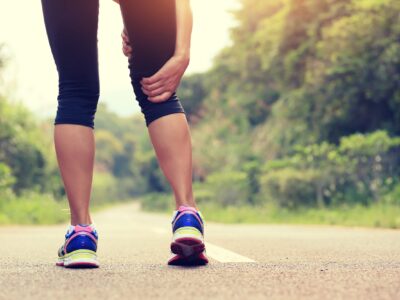 Young runner with pain in her leg