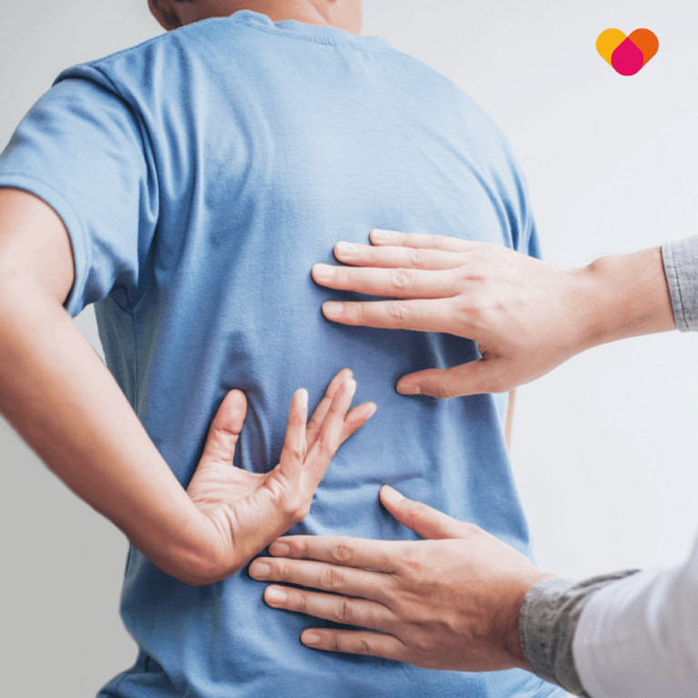 Man suffering with back pain because of disc disorder