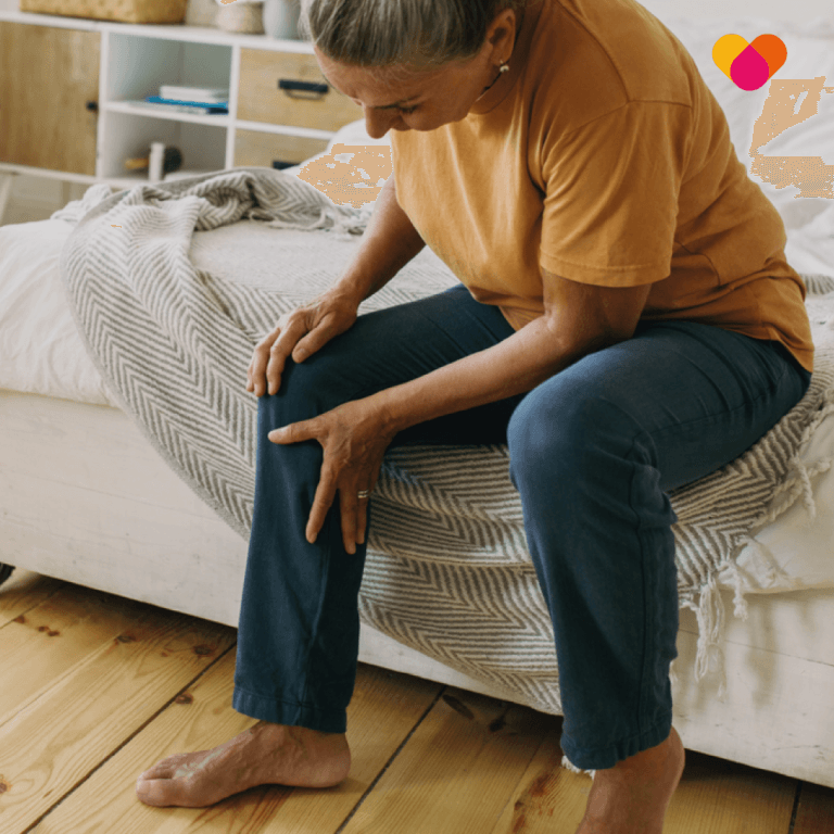 Middle aged woman suffering with osgood schlatters and knee pain
