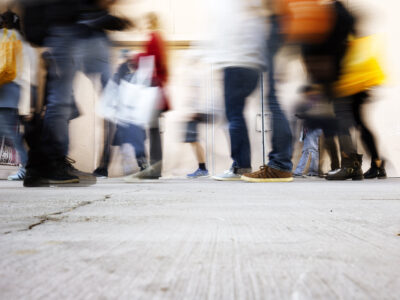 Blurry crowd of people walking