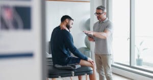 Image of a patient with physiotherapist at Spectrum Health clinic