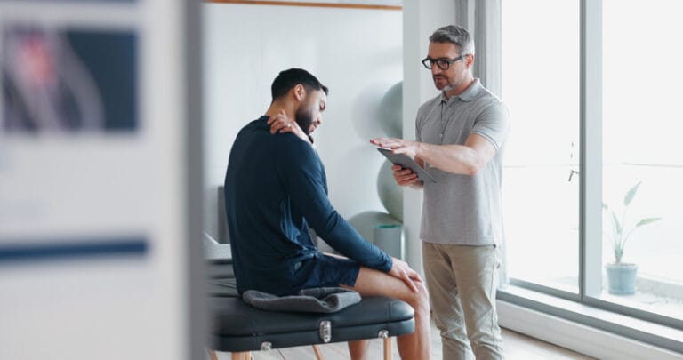 Image of a patient with physiotherapist at Spectrum Health clinic