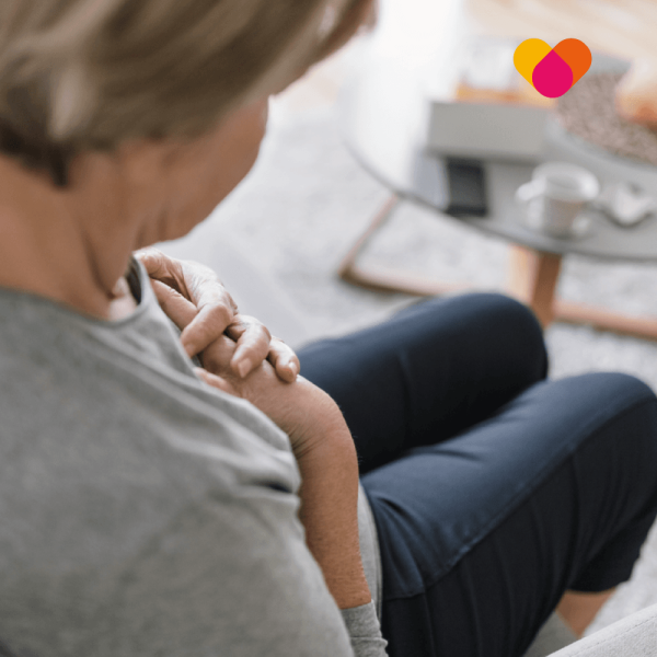 Elderly woman suffering with a heart condition